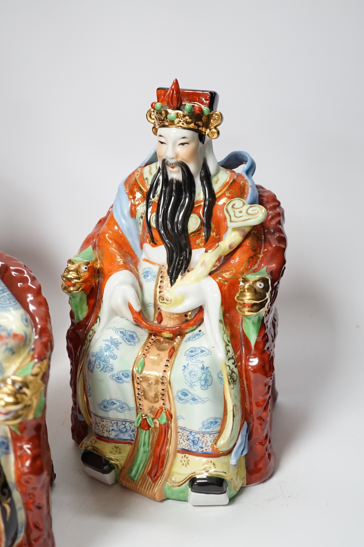 A set of three Chinese famille rose figures of the Three Star Gods (Sanxing), largest 25cm high